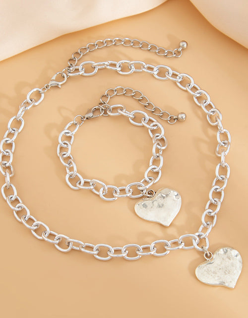 Load image into Gallery viewer, Ins style heart-shaped pendant collarbone chain set, fashionable metal photosensitive surface necklace
