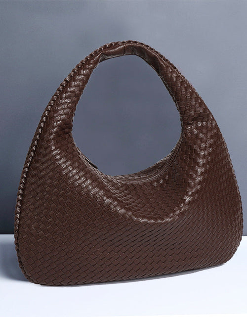 Load image into Gallery viewer, Crescent shaped women's bag hand woven hand-held dumpling bag fashionable single shoulder armpit bag
