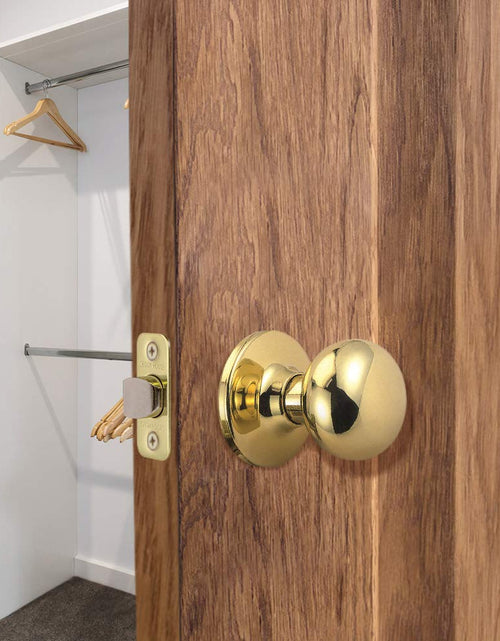 Load image into Gallery viewer, Design House Cambridge 2-Way Latch Passage Door Knob Polished Brass
