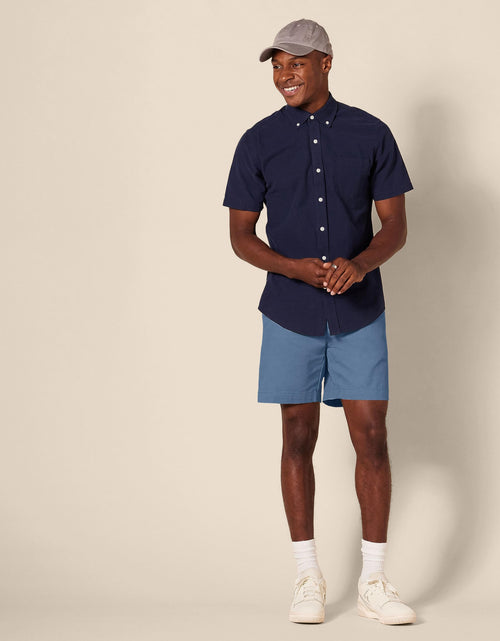 Load image into Gallery viewer, Amazon Essentials Men's Slim-Fit 7" Chino Shorts Deep Blue Size 30
