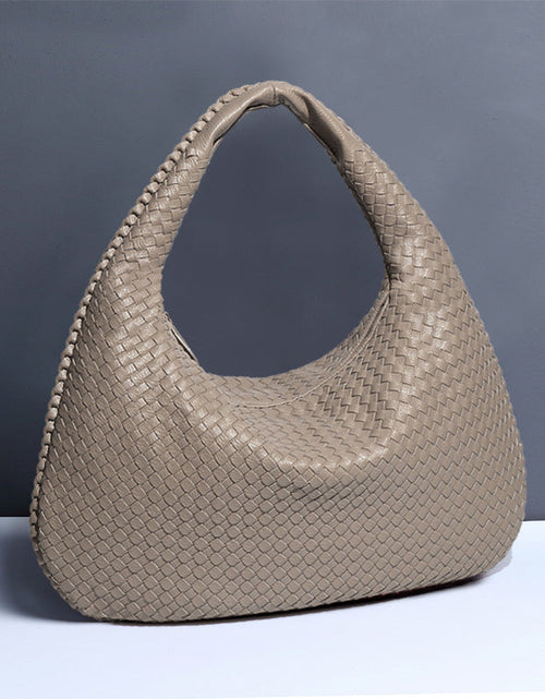 Load image into Gallery viewer, Crescent shaped women's bag hand woven hand-held dumpling bag fashionable single shoulder armpit bag
