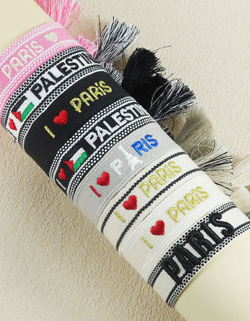Load image into Gallery viewer, Embroidered Eiffel Tower ethnic style woven ribbon wrist strap Paris Sports Games wristband souvenir from France
