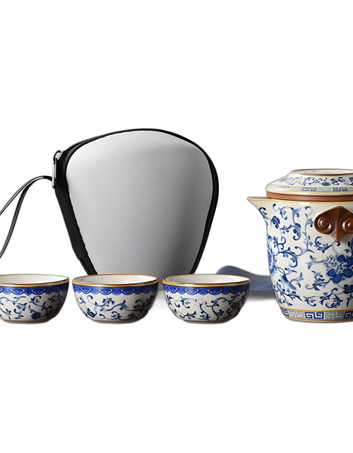 Load image into Gallery viewer, Blue and white beige Ru kiln travel tea set one pot three cups outdoor portable entwined lotus ceramic retro teapot
