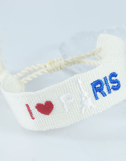 Load image into Gallery viewer, Embroidered Eiffel Tower ethnic style woven ribbon wrist strap Paris Sports Games wristband souvenir from France
