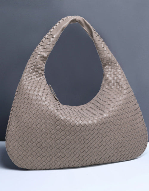 Load image into Gallery viewer, Crescent shaped women's bag hand woven hand-held dumpling bag fashionable single shoulder armpit bag
