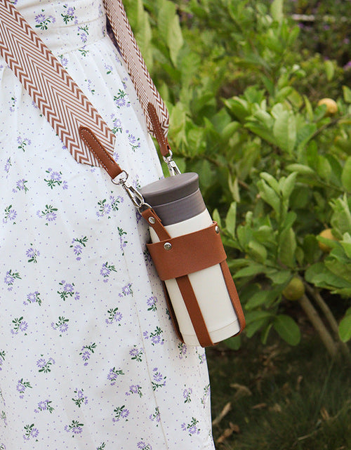Load image into Gallery viewer, Outdoor insulated cup diagonal cup cover detachable woven shoulder strap bottle cover stainless steel kettle cover
