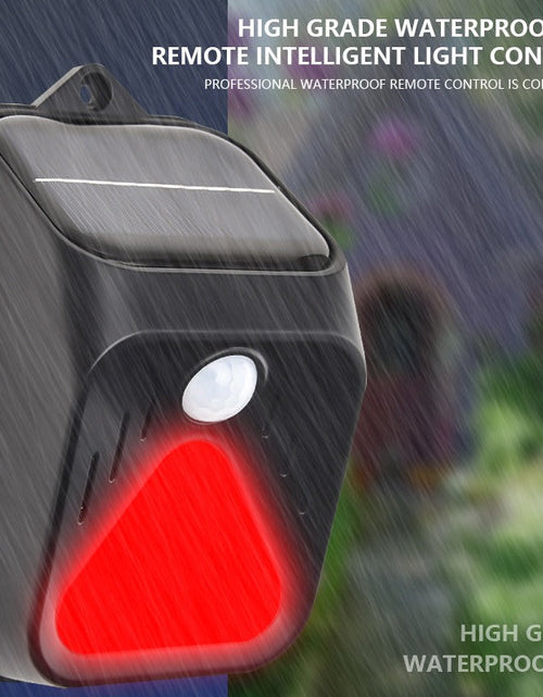 Load image into Gallery viewer, New Solar Alarm Light Human Body Sensing Remote Alarm To Drive Away Animals Solar Alarm Light
