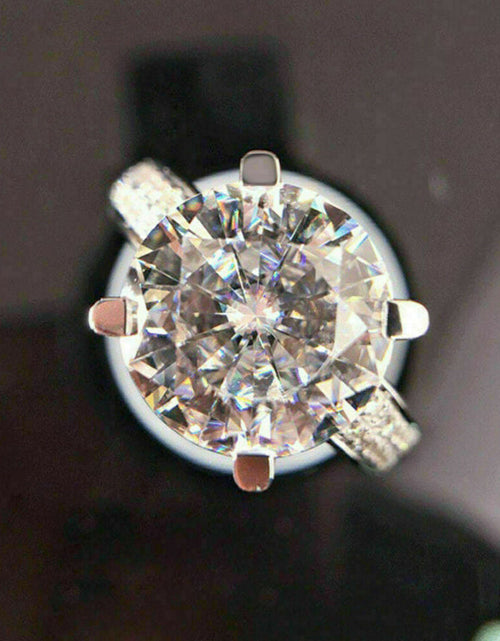 Load image into Gallery viewer, Korean version of light luxury fashion four claw flower bud simulation diamond ring engagement and proposal ring
