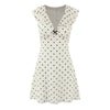 Beige with black dots