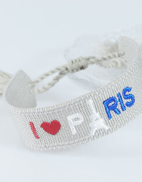 Load image into Gallery viewer, Embroidered Eiffel Tower ethnic style woven ribbon wrist strap Paris Sports Games wristband souvenir from France
