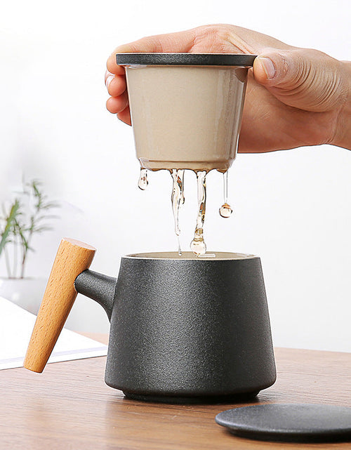 Load image into Gallery viewer, Wooden Handle Ceramic Tea Cup With Lid Filter Tea Cup Tea Water Separation Cup Flower Tea Cup Office Cup
