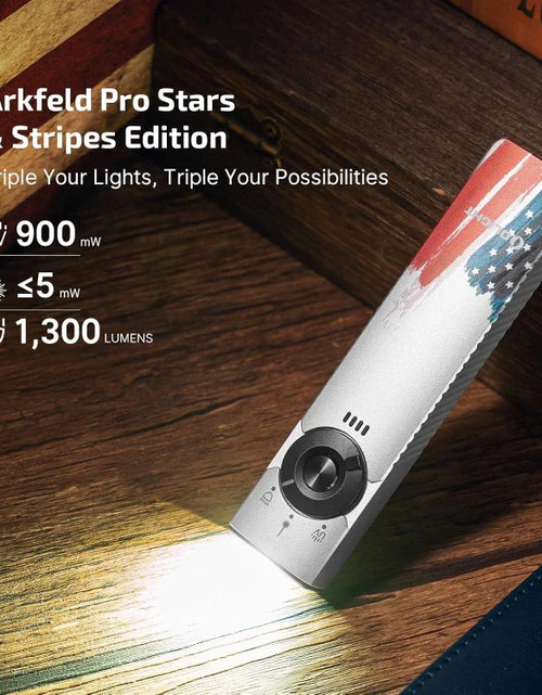 Load image into Gallery viewer, OLIGHT ARKFELDPRO3RSTARS Arkfeld Pro Flat EDC Flashlight with LED Light UV and Laser - Stars &amp; Stripes Edition
