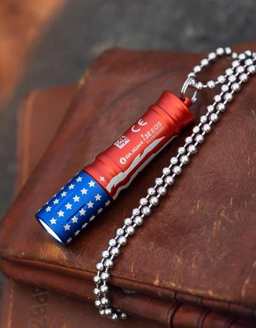 Load image into Gallery viewer, OLIGHT I3ESTARSSTRIPES i3E EOS Keychain Flashlight - Stars &amp; Stripes Edition
