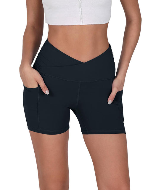 Load image into Gallery viewer, ODODOS Gathered Cross Waist Yoga Shorts with Pockets Navy Size XS
