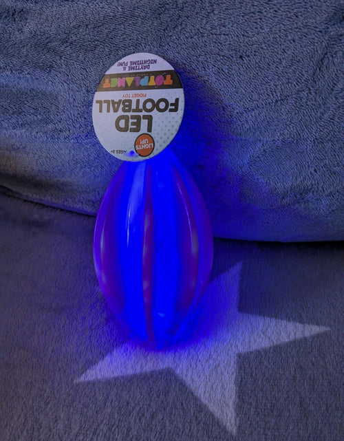 Load image into Gallery viewer, LED Football Toy Planet Fidget Toy Purple Swirl 6" x 3.25"
