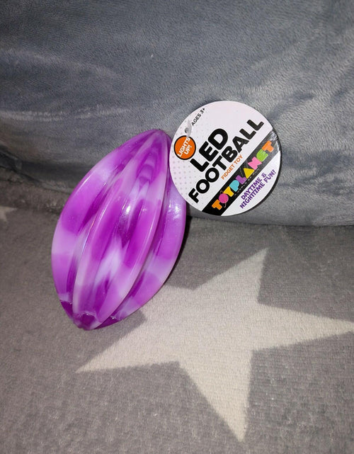 Load image into Gallery viewer, LED Football Toy Planet Fidget Toy Purple Swirl 6" x 3.25"
