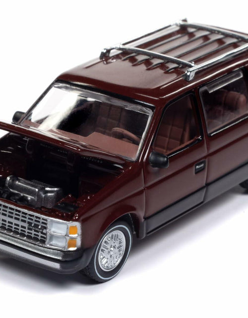 Load image into Gallery viewer, Auto World 1985 Dodge Caravan AWSP167B Black 1/64 Diecast Model
