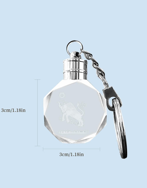 Load image into Gallery viewer, Artmosphere Taurus Zodiac Crystal LED Keychain Color Changing Transparent
