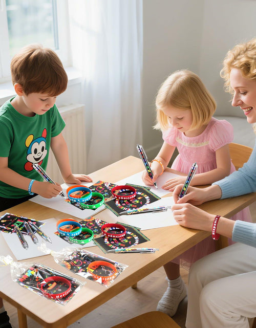 Load image into Gallery viewer, MUOUAKATE 90 Pcs Hispanic Month Party Favors Silicone Bracelets Pens

