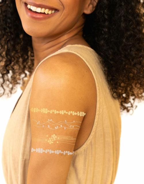 Load image into Gallery viewer, Tattly Metallic Festival Temporary Tattoos 20 Pieces Skin-Safe Vegan Ink
