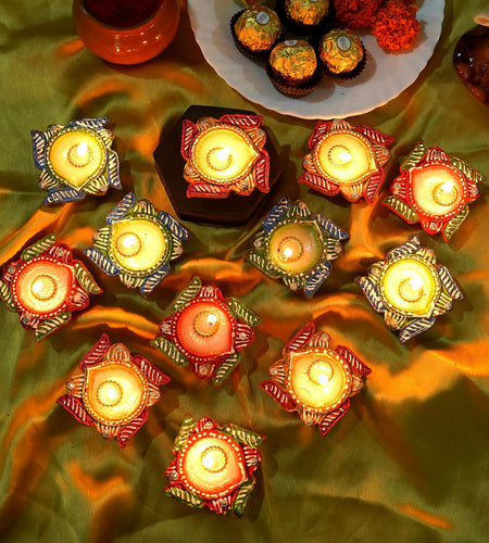 4OUR FAITH 12 Pc Multicolor Terracotta Swastik Wax Diyas Oil Lamps