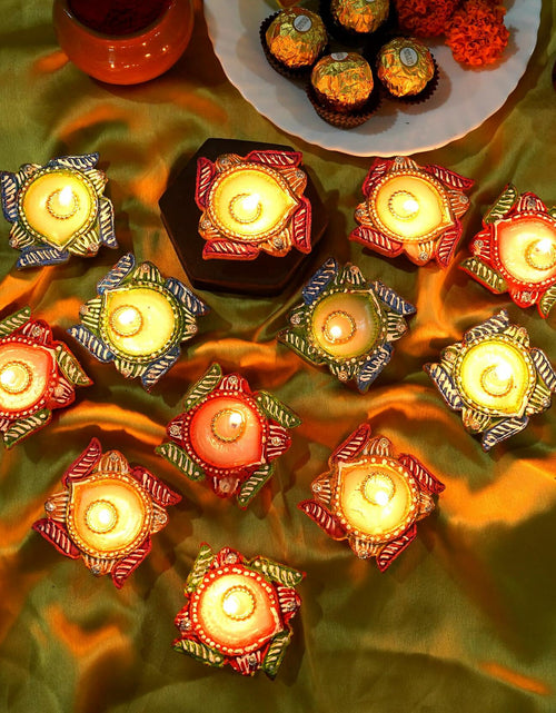 Load image into Gallery viewer, 4OUR FAITH 12 Pc Multicolor Terracotta Swastik Wax Diyas Oil Lamps
