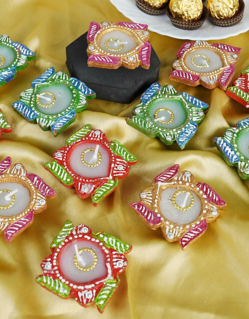 Load image into Gallery viewer, 4OUR FAITH 12 Pc Multicolor Terracotta Swastik Wax Diyas Oil Lamps
