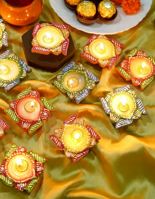 Load image into Gallery viewer, 4OUR FAITH 12 Pc Multicolor Terracotta Swastik Wax Diyas Oil Lamps
