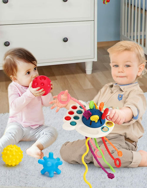 Load image into Gallery viewer, Thremhoo Montessori Silicone Baby Pull String Toy Toddler Red Blue Multi-color
