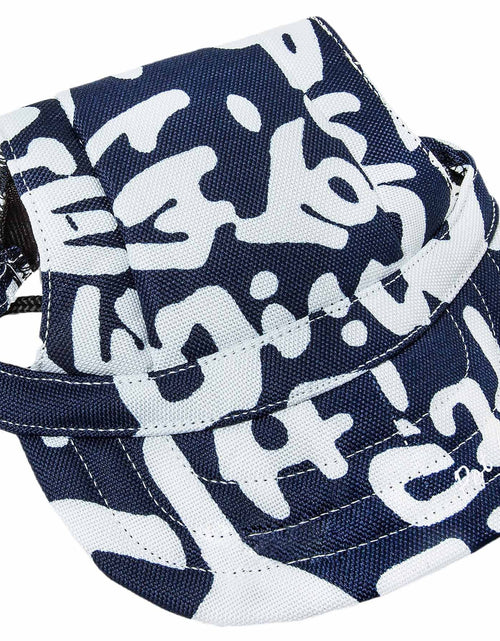 Load image into Gallery viewer, Pet Life ®  'Bone Cappa' Graffiti Sculptured Uv Protectant Adjustable Fashion Dog Hat Cap
