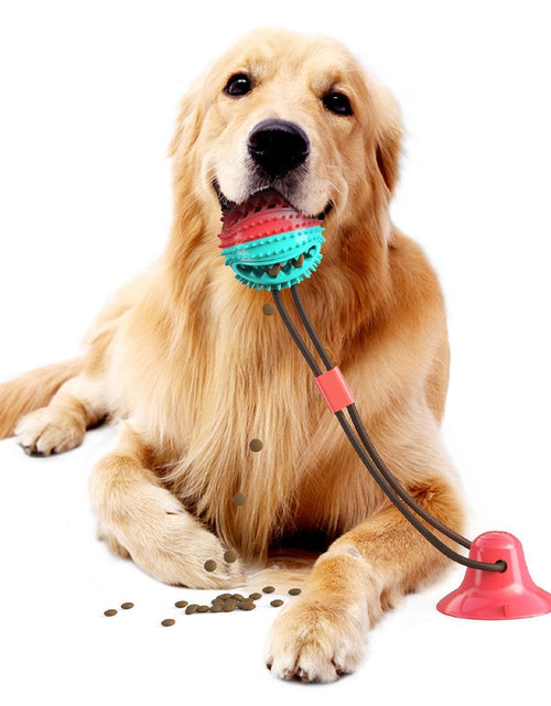 Load image into Gallery viewer, Pet Life ® 'Grip N' Play' Treat Dispensing Ball Shaped Suction Cup Dog Toy
