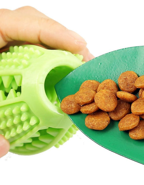 Load image into Gallery viewer, Pet Life ® 'Grip N' Play' Treat Dispensing Football Shaped Suction Cup Dog Toy
