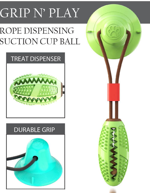 Load image into Gallery viewer, Pet Life ® 'Grip N' Play' Treat Dispensing Football Shaped Suction Cup Dog Toy
